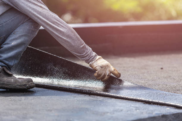 Professional Basement Waterproofing technician working in Mundelein, IL